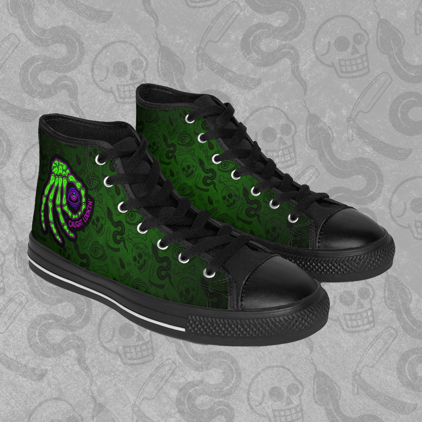 Caught Lookin' design printed on the outside panel of rubber toed, high-top sneakers. Green and black Blood Hex pattern all over print background. 