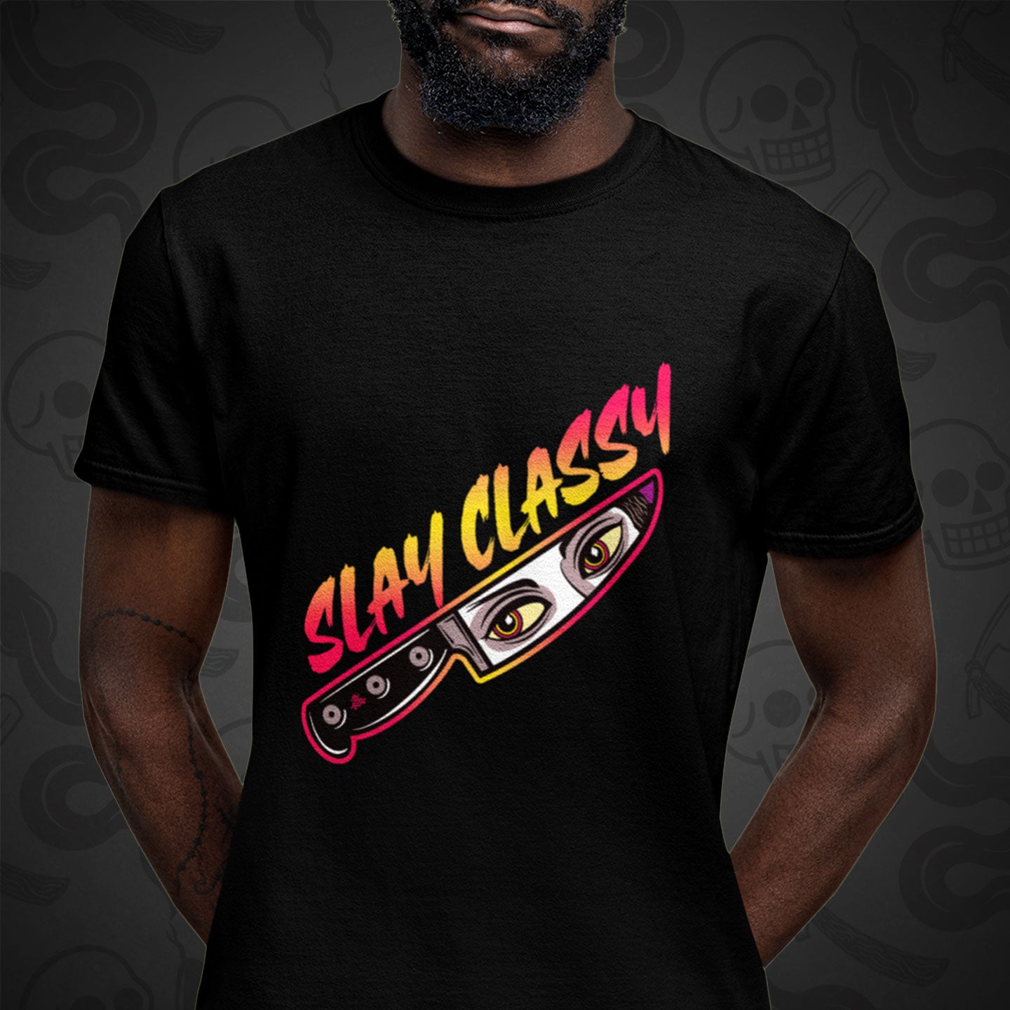 Cropped image of a model wearing black t-shirt with the Slay Classier design printed on the front with vibrant colors.