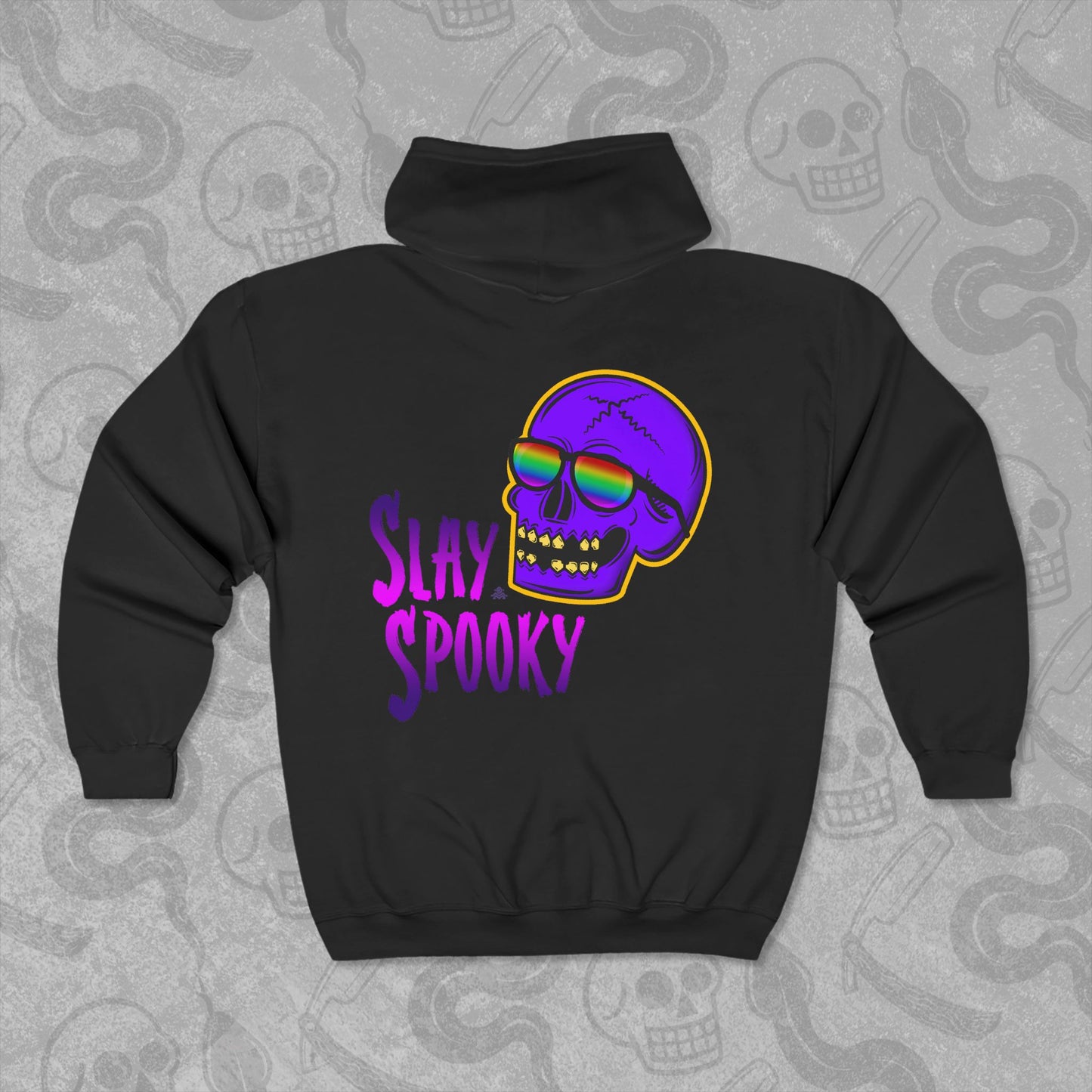 Slay Spooky design printed on the back of a black zippered hoodie with vibrant colors.